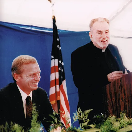 0063 Father Hank Brennan and REB Bush lunceon Brielle 1982 Edited denoise faceai sharpen